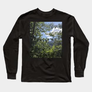 Peeking through trees at Glacier National Park Long Sleeve T-Shirt